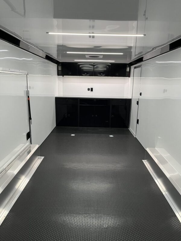 enclosed-atc-car-trailer-2026-24ft-aluminum-rom-400-w-large-escape-door-1-1.jpeg