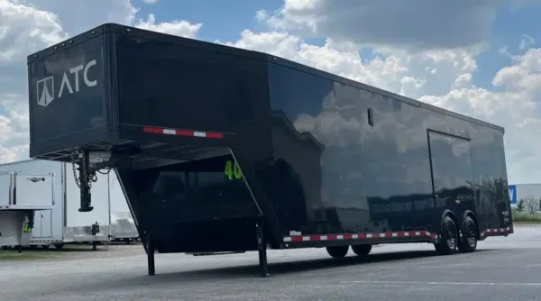enclosed-atc-gooseneck-car-trailer-2026-40ft-aluminum-rom-500-w-black-trim-3.webp
