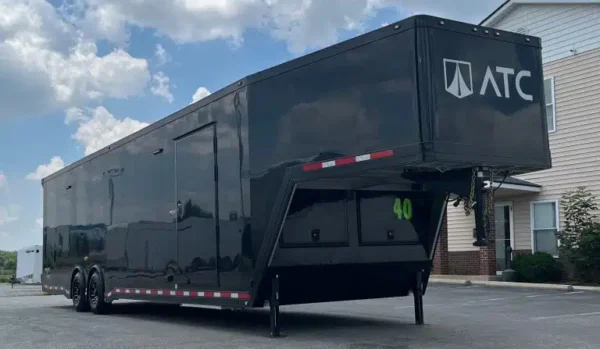 enclosed-atc-gooseneck-car-trailer-2026-40ft-aluminum-rom-500-w-black-trim-4.webp