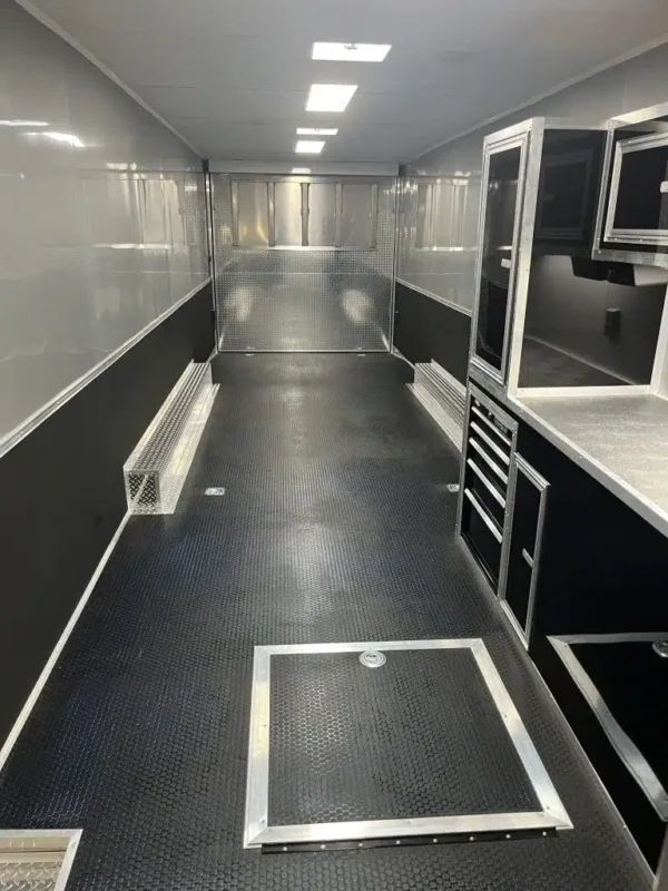 enclosed-car-trailer-2025-34ft-platinum-w-large-corner-bathroom-electric-3.webp