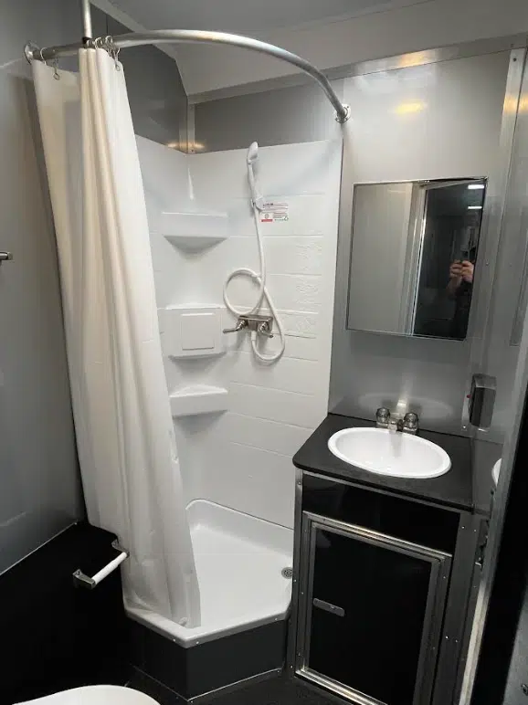 enclosed-car-trailer-2025-34ft-platinum-w-large-corner-bathroom-electric-5.webp