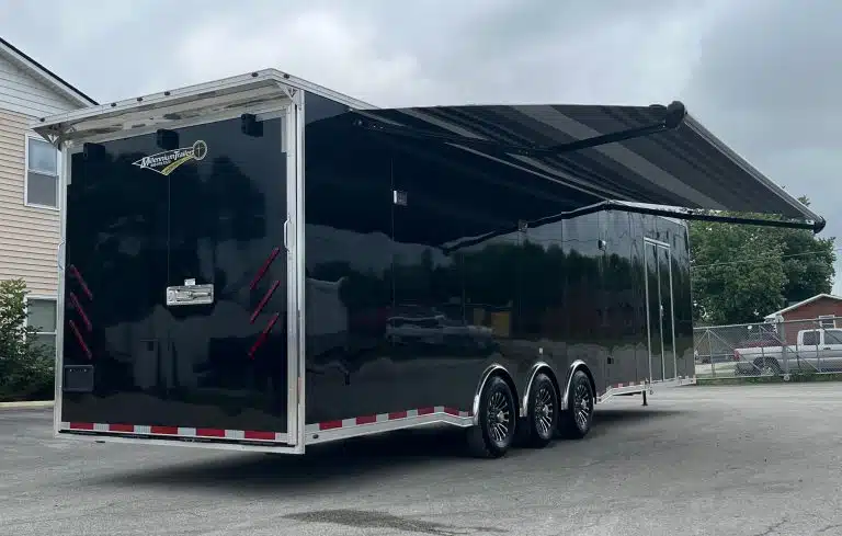 enclosed-car-trailer-2025-34ft-platinum-w-large-corner-bathroom-electric.webp