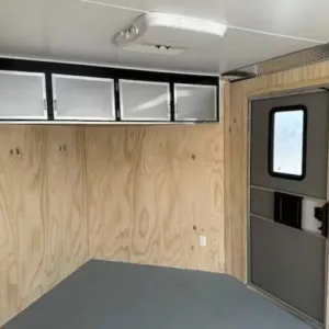 Car-Mate-8.5x20-Enclosed-Cargo-Trailer-V-Nose-Windows-Cabinets-AC-Unit-Electrical-Package-Aluminum-Wheels-7.webp