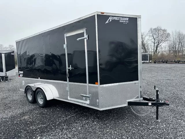 Homesteader-7-x-16-Enclosed-Cargo-Trailer-V-Nose-7ft-Interior-Height-Diamond-Plate-Skirting-OHV-2.webp Homesteader-7-x-16-Enclosed-Cargo-Trailer-V-Nose-7ft-Interior-Height-Diamond-Plate-Skirting-OHV-2.webp